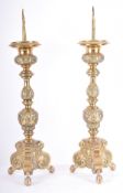 LARGE PAIR OF 17TH CENTURY BRASS WORKED ALTAR PRICKETS
