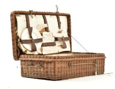SIX PERSON CORACLE WICKER PICNIC BASKET CIRCA 1920S