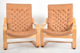 NOBORU NAKAMURA FOR IKEA - PAIR OF LEATHER ARMCHAIRS