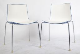 MANNER OF HERMAN MILLER - PAIR OF CONTEMPORARY PLASTIC CHAIRS