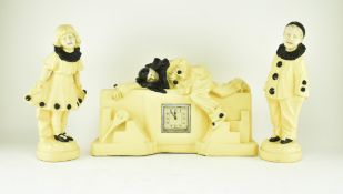 PLASTER 1930S ART DECO THREE PIECE CLOWN CLOCK GARNITURE