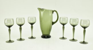 SIX SMOKED GREY GLASS WINE GLASSES & MATCHED PITCHER JUG