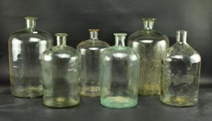 SIX EARLY 20TH CENTURY & LATER GLASS DEMIJOHNS