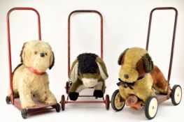 THREE VINTAGE 20TH CENTURY PUSH ALONG DOG TOYS