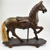 EARLY 20TH CENTURY WOODEN PUSH ALONG HORSE TOY