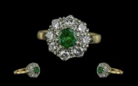 Ladies 18ct Gold and Platinum Diamond and Emerald Set Cluster Ring, Flower head Setting, Marked 18ct