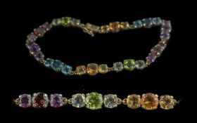 Ladies Attractive 10ct Gold Multi Gem Set Bracelet, Marked 10ct. Gems Set Includes Peridots,