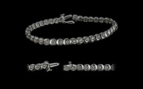 9ct White Gold Diamond Set Bracelet, set with round cut diamonds, weight 11.10 grams. Fully