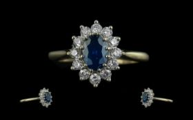 Ladies Attractive 18ct Gold Sapphire & Diamond Set Cluster Ring, flowerhead setting, marked 18ct
