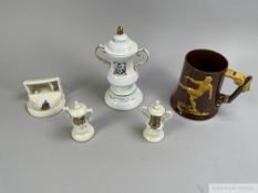 A crested Arcadian model of the F.A.Cup, another larger example by Blue Moor