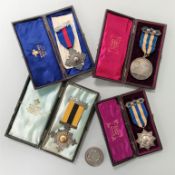 A Sterling silver swimming medal