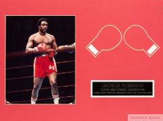 George Foreman signed photograph display,