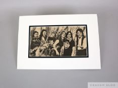 A mounted black and white photographic print of Wings