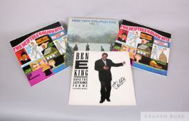 Four signed vinyl records