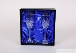 A set of glass tumblers and two wine glasses and a produced exclusively for the members of 3rd Edge