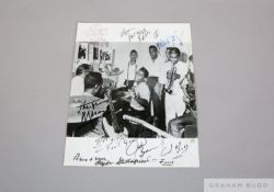 A black and white image of James Brown and the Famous Flames