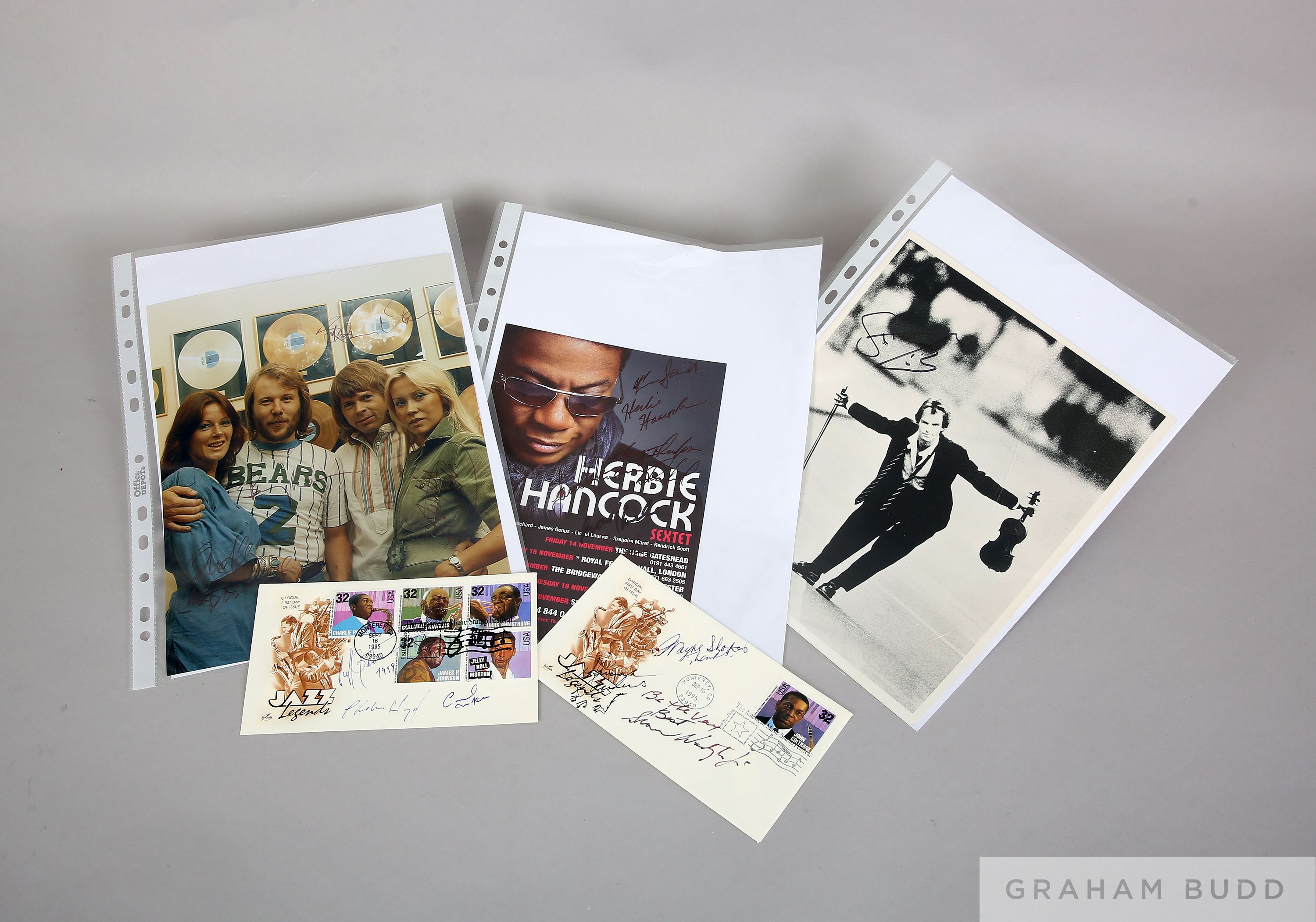 A selection of signed photographic prints including Abba