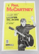 A large Paul McCartney poster for the concert that took place at Kings Dock Liverpool on