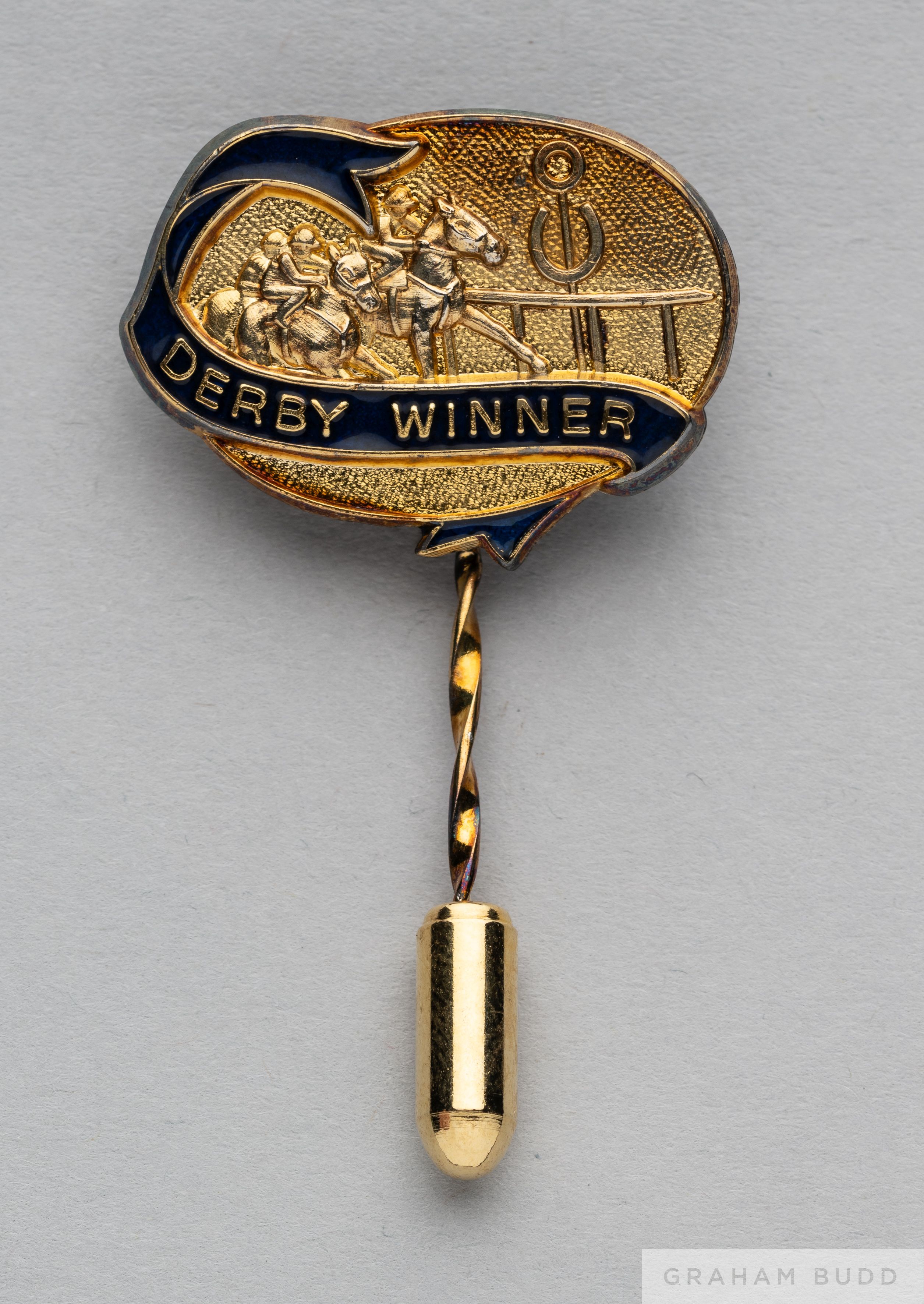 Pat Eddery silver-gilt and enamel Derby Winner stick pin by Spink of London, stamped silver, with