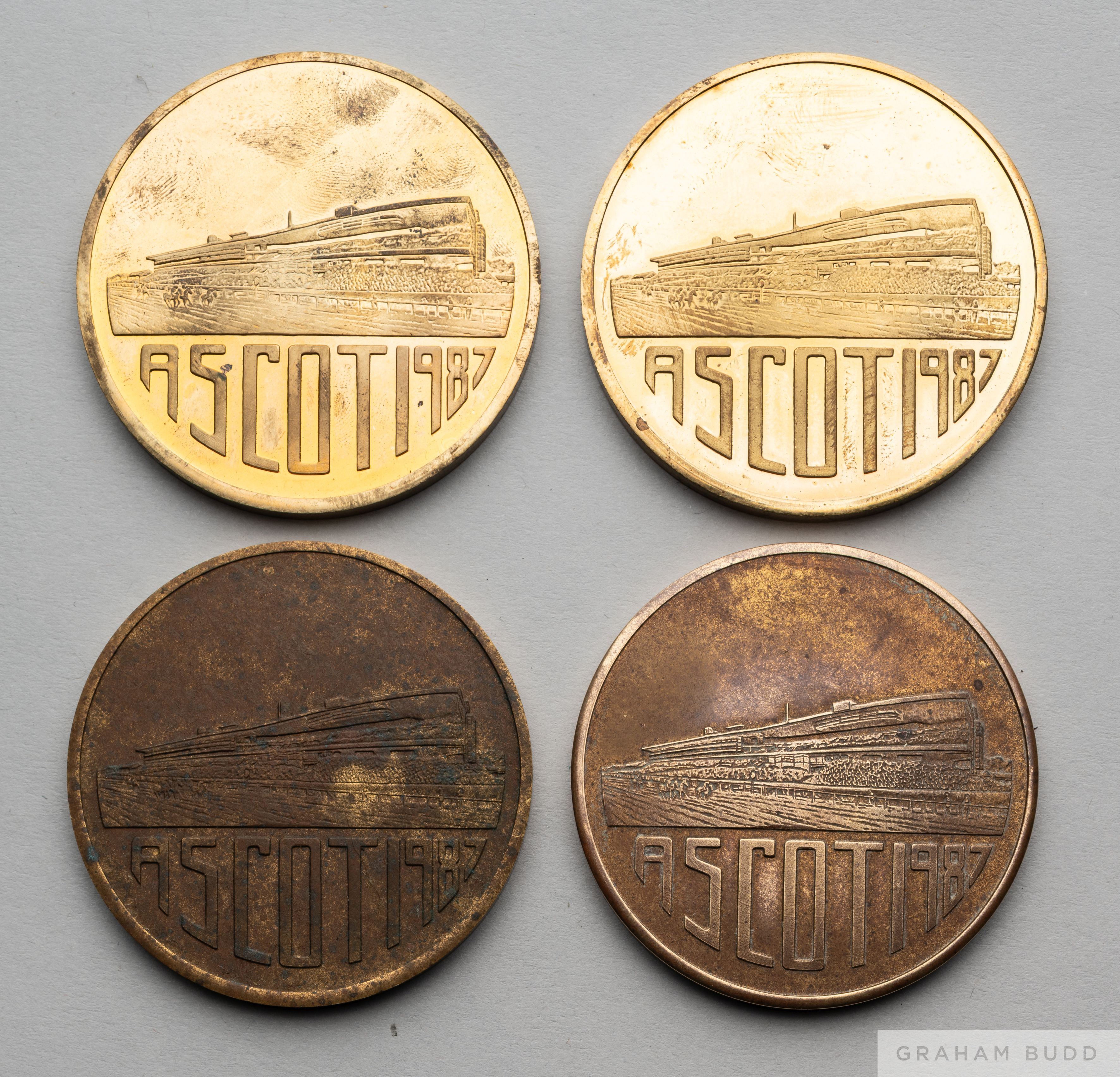Four 1987 Ascot Festival of Racing commemorative medallions presented to the jockey Pat Eddery, in