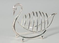 A SILVER PLATED SWAN TOAST RACK.
