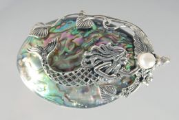 A SILVER ABALONE SHELL MERMAID PENDANT.