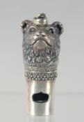 A SILVER BEAR WHISTLE, 3.5cm long.