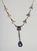 A 9ct. GOLD AND SILVER AMETHYST AND DIAMOND NECKLACE.