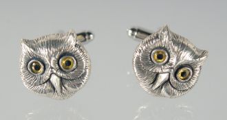 A PAIR OF SILVER OWL CUFFLINKS