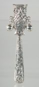A SILVER OWL RATTLE.