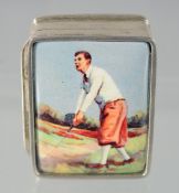 A SILVER AND ENAMEL GOLF PILL BOX, 3 cm.