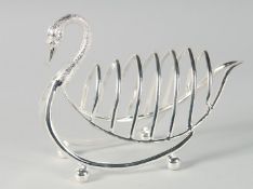 A SILVER PLATED SWAN TOAST RACK.