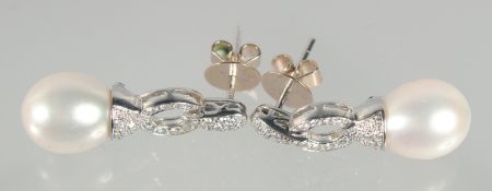 A GOOD PAIR OF 18ct. WHITE GOLD FRESHWATER PEARL AND DIAMOND EARRINGS.