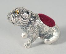 A CAST SILVER BULLDOG PIN CUSHION, 3.5 cm.