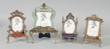 FOUR ENAMEL CHAIR DESIGN PHOTOGRAPH FRAMES, 17 cm x 10 cm.