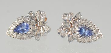 A GOOD PAIR OF 9ct. GOLD DIAMOND AND TANZANITE EARRINGS.