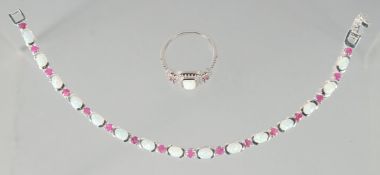 A GOOD SILVER OPAL AND RUBY BRACELET AND RING.