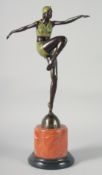 AFTER J. PHILIPP. A BRONZE DANCING GIRL, signed, on a circular marble base. 55 cm.