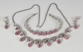 A GOOD SILVER RUBY AND MARCASITE NECKLACE, BRACELET AND EARRING SET.