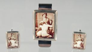 A SILVER MONEY CLIP AND CUFFLINKS.