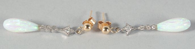 A PAIR OF 9ct. GOLD TEARDROP OPAL AND DIAMOND EARRINGS.