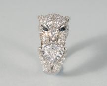 A SILVER PANTHER RING.