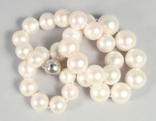 A GOOD ROW OF FRESHWATER PEARLS. 18in.