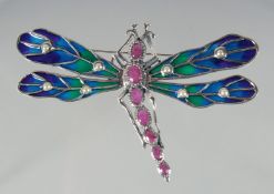 A SILVER RUBY AND PEARL DRAGONFLY BROOCH.