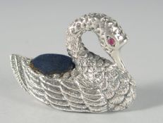 A CAST SILVER SWAN PIN CUSHION, 5.5 cm.