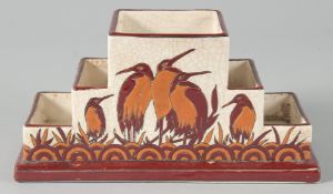 A POTTERY STORK VASE, 23 cm.