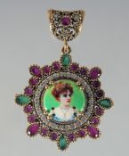 A SILVER AND ENAMEL PENDANT.