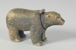 A BRASS POLAR BEAR PIN CUSHION. 6cm.