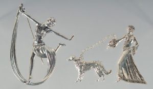 TWO SILVER ART DECO LADY BROOCHES.