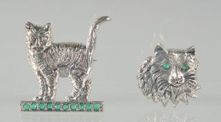TWO SILVER CAT BROOCHES.
